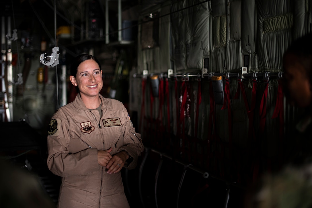 Maj. Marshall talks with 386th AEW Airmen in a C-130H Hercules