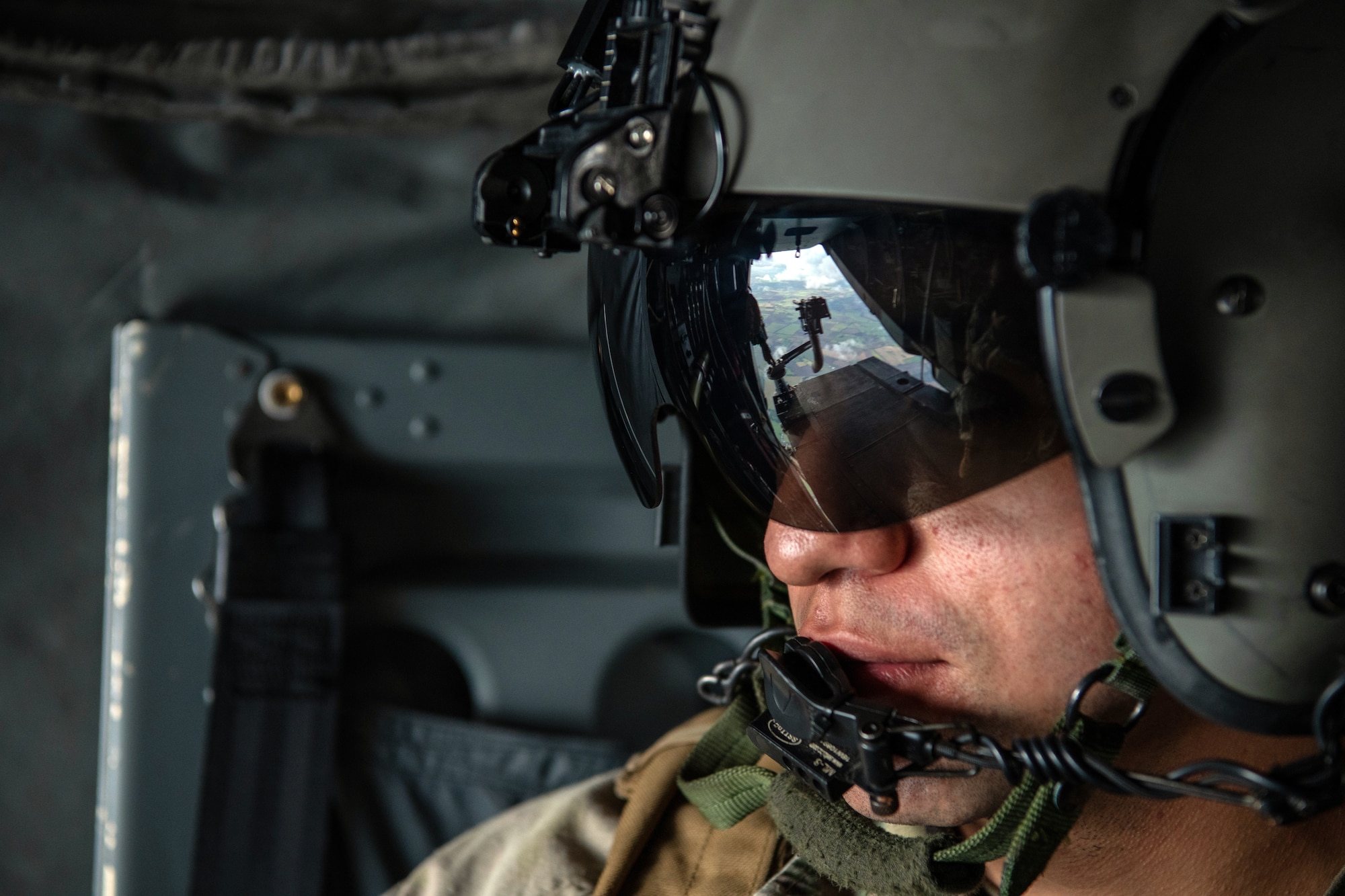 A U.S. Air Force flight engineer mans the rear of a CV-22B Osprey