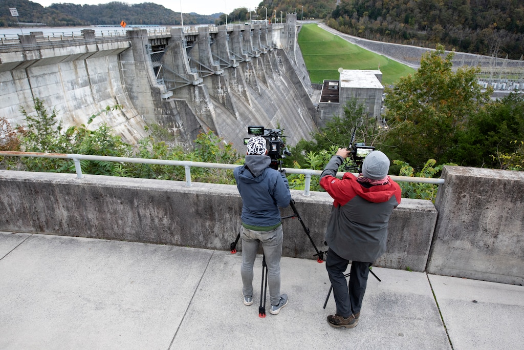 Director Zebediah Smith (Left) and First Assistant Camera Barrett Dennison with Open Jaw Productions captures video Nov. 3, 2021 of Center Hill Dam on the Caney Fork River in Lancaster, Tennessee, for a U.S. Army Corps of Engineers National Inventory of Dams video production. (USACE Photo by Lee Roberts)