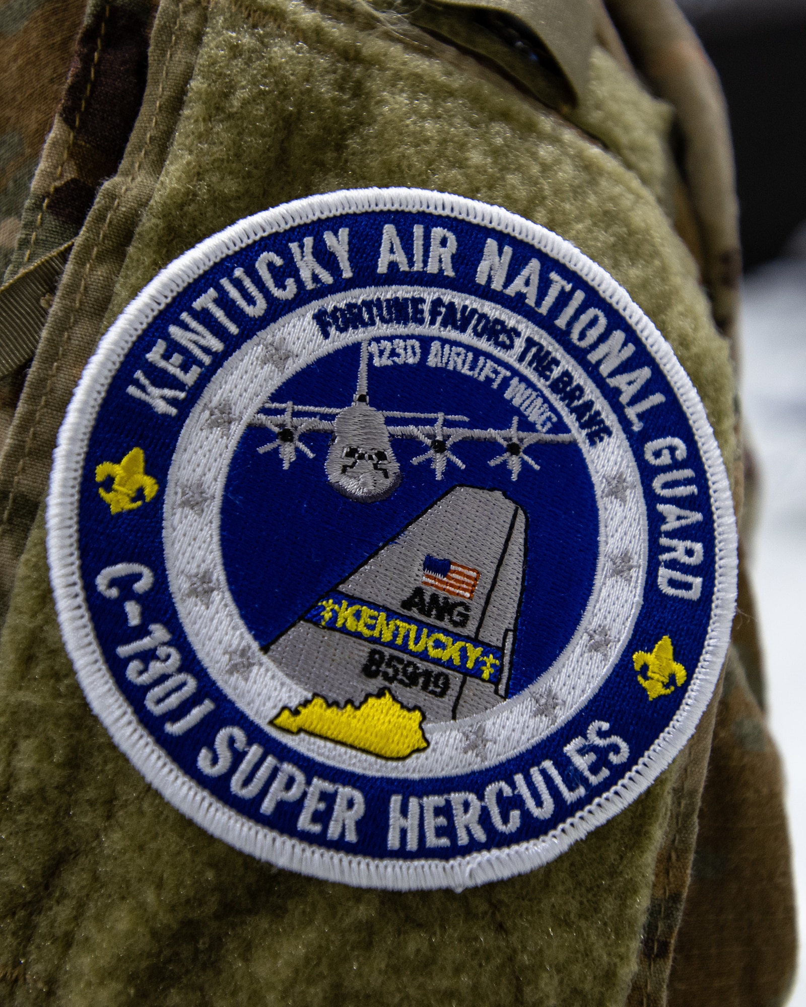 A distinctive patch commemorates the arrival of two new C-130J Super Hercules aircraft at the Kentucky Air National Guard Base in Louisville, Ky., Nov. 6, 2021, ushering in a new era of aviation for the 123rd Airlift Wing. The state-of-the-art transports are among eight the wing will receive over the next 11 months to replace eight aging C-130 H-model aircraft, which entered service in 1992 and have seen duty all over the world. (U.S. Air National Guard photo by Dale Greer)