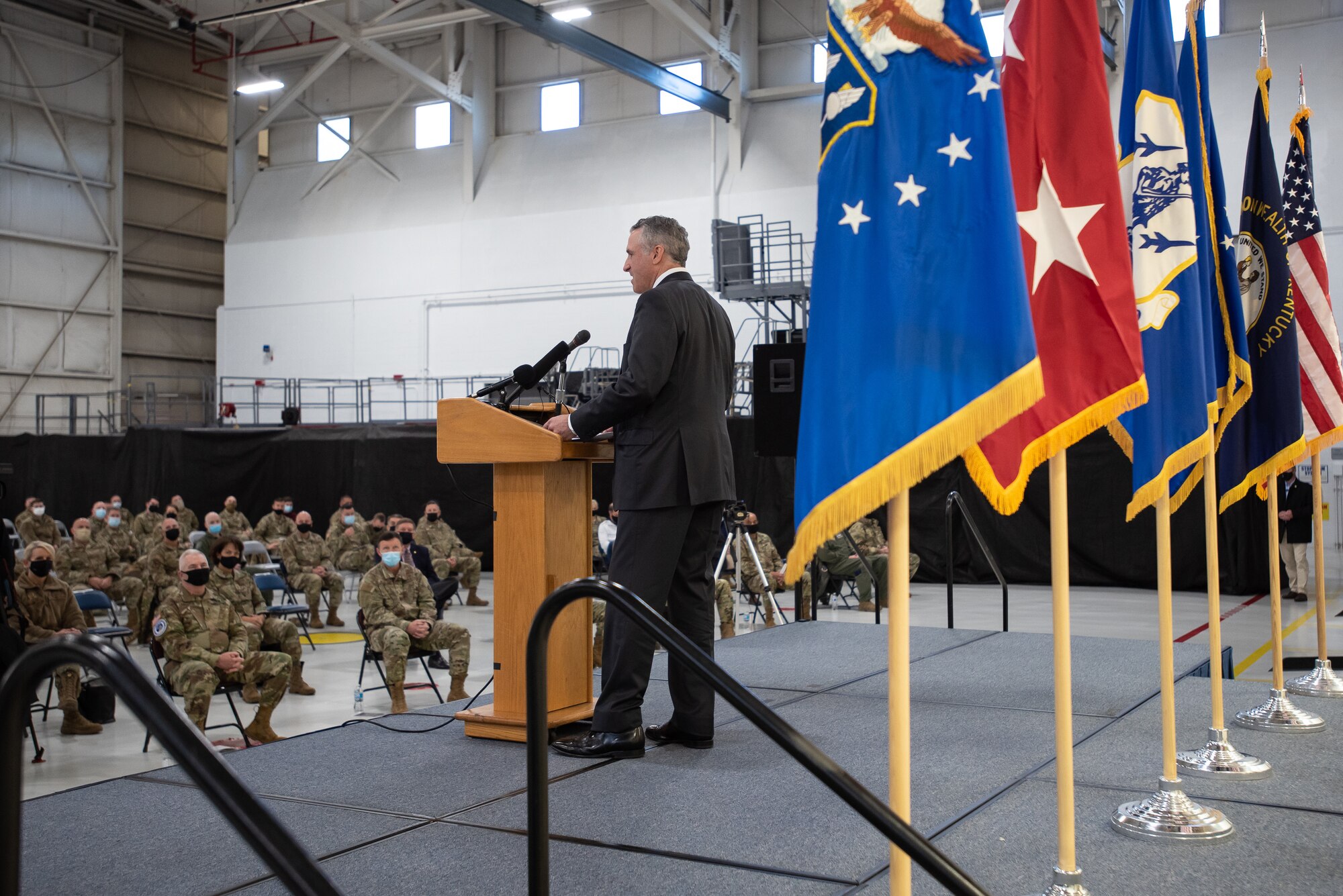 Tony Frese, vice president and deputy of C-130 programs for Lockheed Martin Co., speaks to the audience during a ceremony at the Kentucky Air National Guard Base in Louisville, Ky., Nov. 6, 2021, to welcome the arrival of two new C-130J Super Hercules aircraft. The state-of-the-art transports are among eight that the 123rd Airlift Wing will receive over the next 11 months to replace eight aging C-130 H-model aircraft, which entered service in 1992 and have seen duty all over the world. (U.S. Air National Guard photo by Dale Greer)