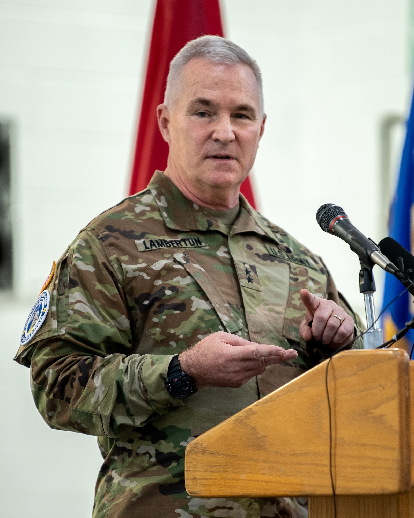 Maj. Gen. Hal Lamberton, adjutant general of the Kentucky National Guard, speaks to audience members during a ceremony at the Kentucky Air National Guard Base in Louisville, Ky., Nov. 6, 2021, to welcome the arrival of two new C-130J Super Hercules aircraft. The state-of-the-art transports are among eight that the 123rd Airlift Wing will receive over the next 11 months to replace eight aging C-130 H-model aircraft, which entered service in 1992 and have seen duty all over the world. (U.S. Air National Guard photo by Dale Greer)