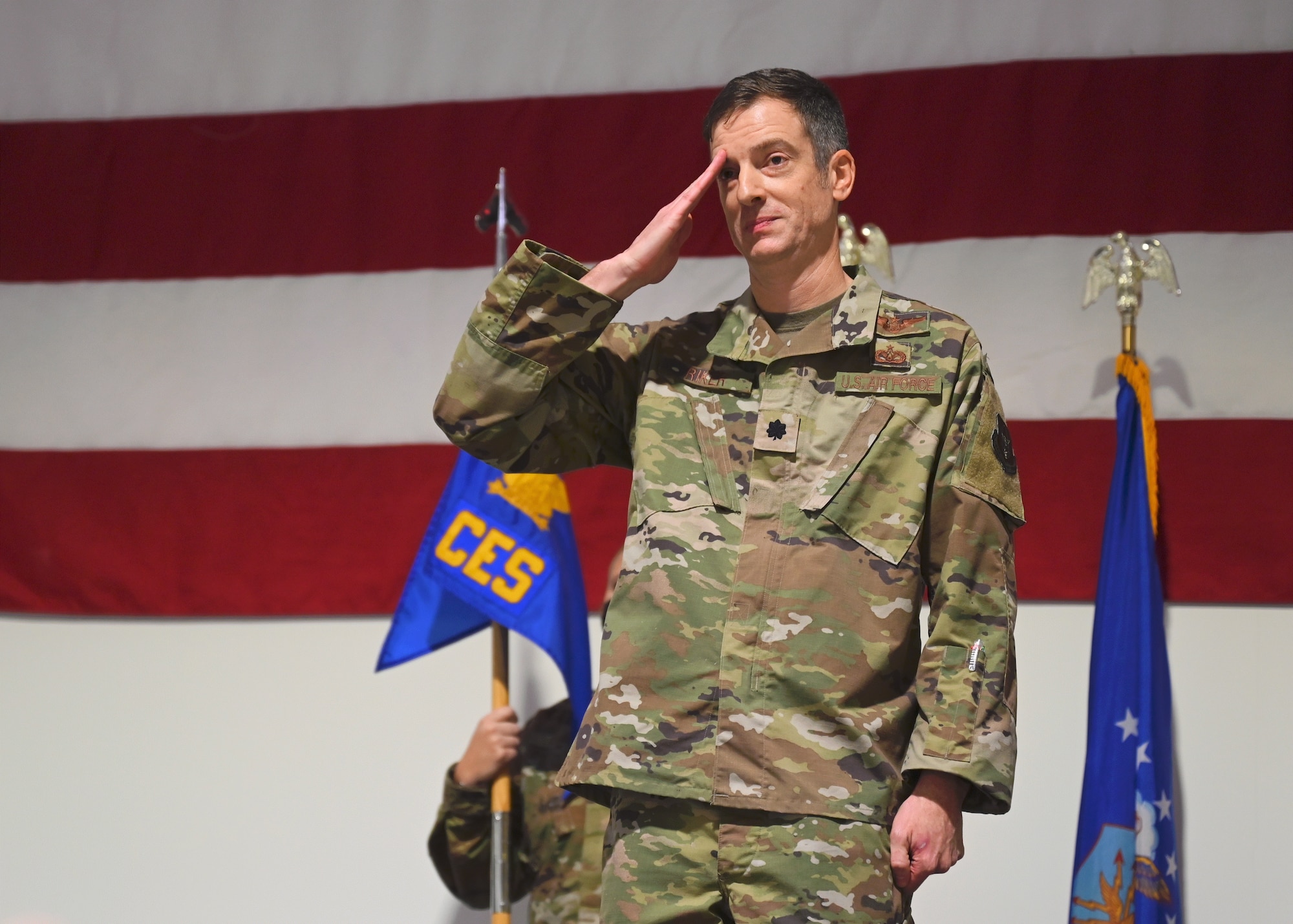 Lt. Col. John Riker renders his first salute to the 442d Civil Engineer Squadron