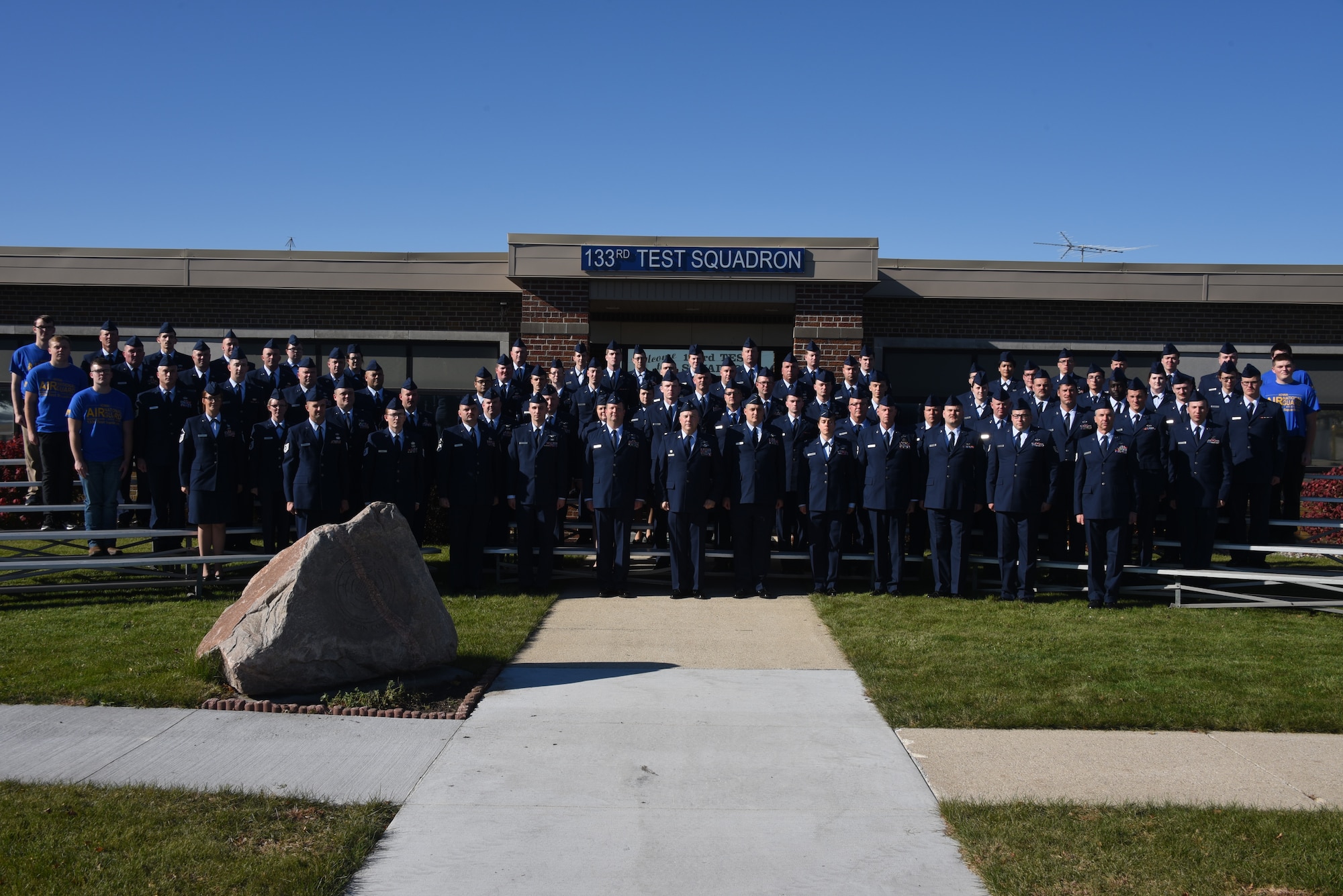 Airmen of the 133rd Test Squadron pose for a photo