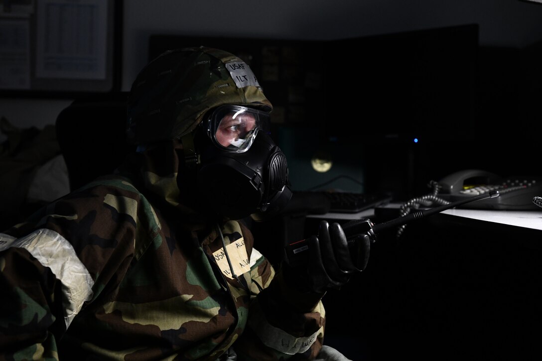 1st Lt. Amelia Leonard responds to a radio transmission during a midpoint inspection readiness exercise November 6, 2021 at Barnes Air National Guard Base, Massachusetts. Midpoint inspections are conducted to evaluate the wing’s capabilities to respond to threats in a contested, degraded, and operationally limited environment. (U.S. Air National Guard photo by Staff Sgt. Hanna Smith)