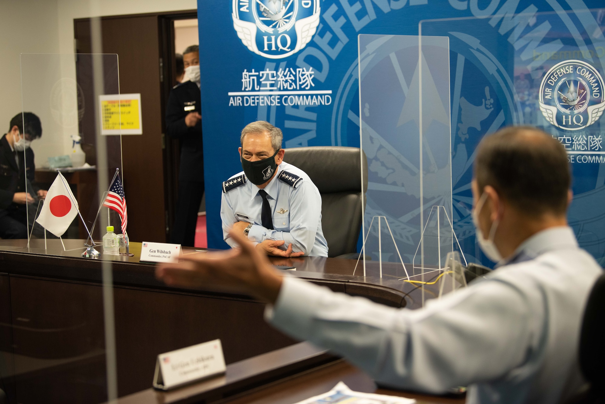 U.S. Air Force Gen. Ken Wilsbach, Pacific Air Forces commander, and Lt. Gen. Hiroaki Uchikura, Japanese Air Self-Defense Force, Air Defense Command commander, attend an office call during an annual site tour of U.S. Air Force and allied commands at Yokota Air Base