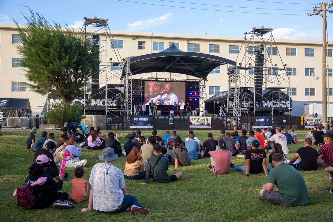 CAMP SCHWAB, OKINAWA, Japan – Okinawa residents and members of the U.S. military community on Okinawa enjoy live entertainment during an open-gate festival at Camp Schwab, Okinawa, Japan, Nov. 7, 2021. The festival was the first open-gate event hosted on Marine Corps installations in Okinawa in over a year due to COVID-19. (U.S. Marine Corps Photo by Matthew Manning)