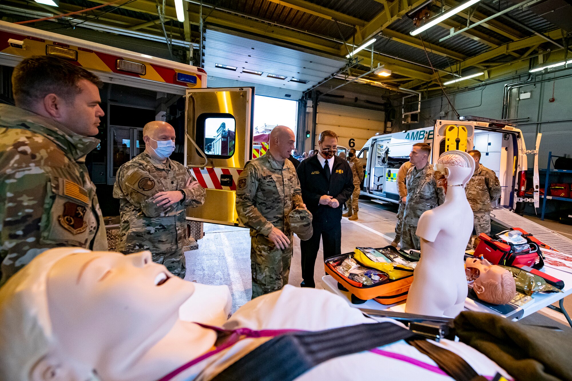 U.S. Air Force Brig. Gen. George T. Dietrich III, center left, U.S. Air Forces in Europe - Air Forces Africa director of logistics, engineering and force protection, looks at a medical display at RAF Molesworth, England, Nov. 5, 2021. Dietrich visited with Airmen from five geographically separated units across the wing and learned more about the unique mission of the 501st CSW. (U.S. Air Force photo by Senior Airman Eugene Oliver)
