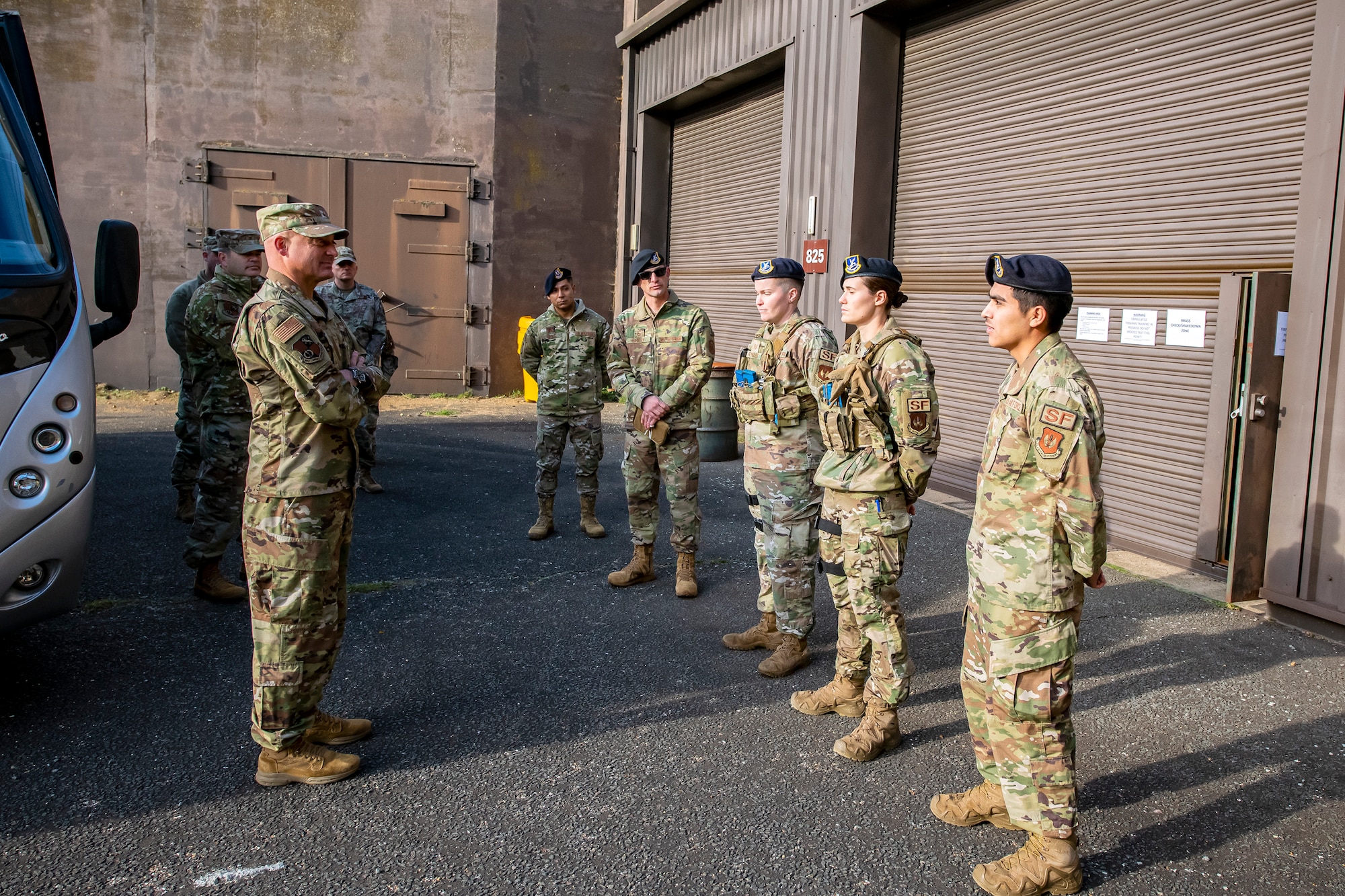 U.S. Air Force Brig. Gen. George T. Dietrich III, left, U.S. Air Forces in Europe - Air Forces Africa director of logistics, engineering and force protection, speaks with Airmen from the 423rd Security Forces Squadron at RAF Molesworth, England, Nov. 5, 2021. Dietrich visited with Airmen from five geographically separated units across the wing and learned more about the unique mission of the 501st CSW. (U.S. Air Force photo by Senior Airman Eugene Oliver)