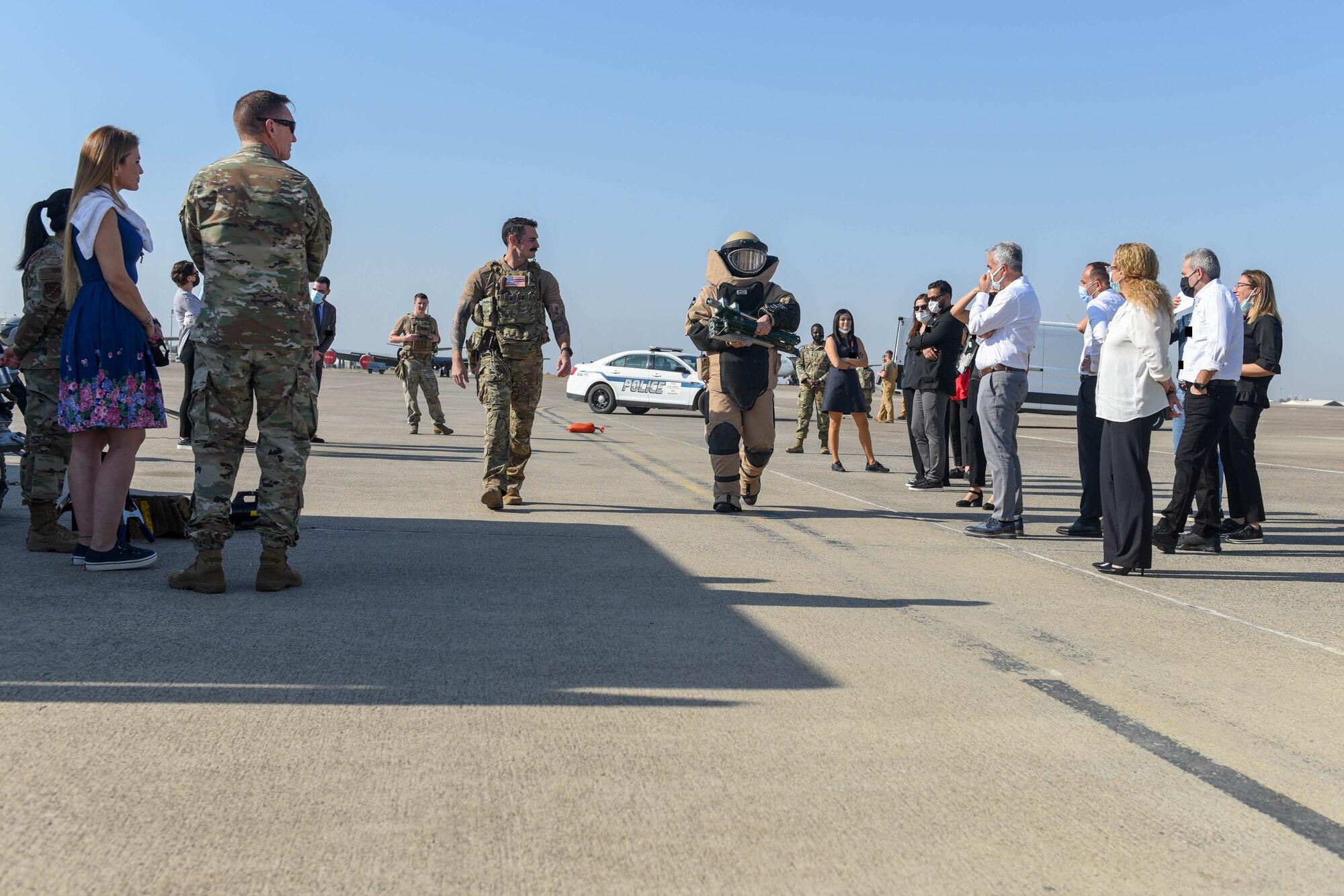 A group of Airmen and Turkish medical professionals on the flightline