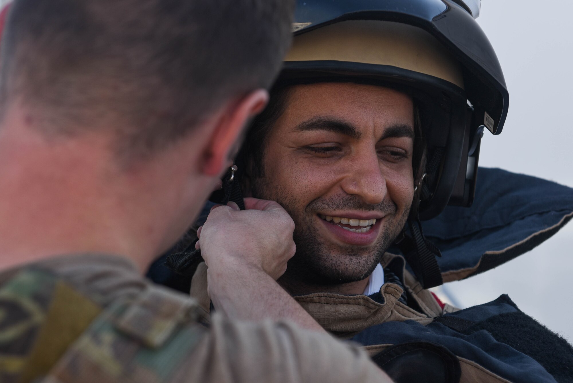 A Turkish medical professional dons a bomb protection suit