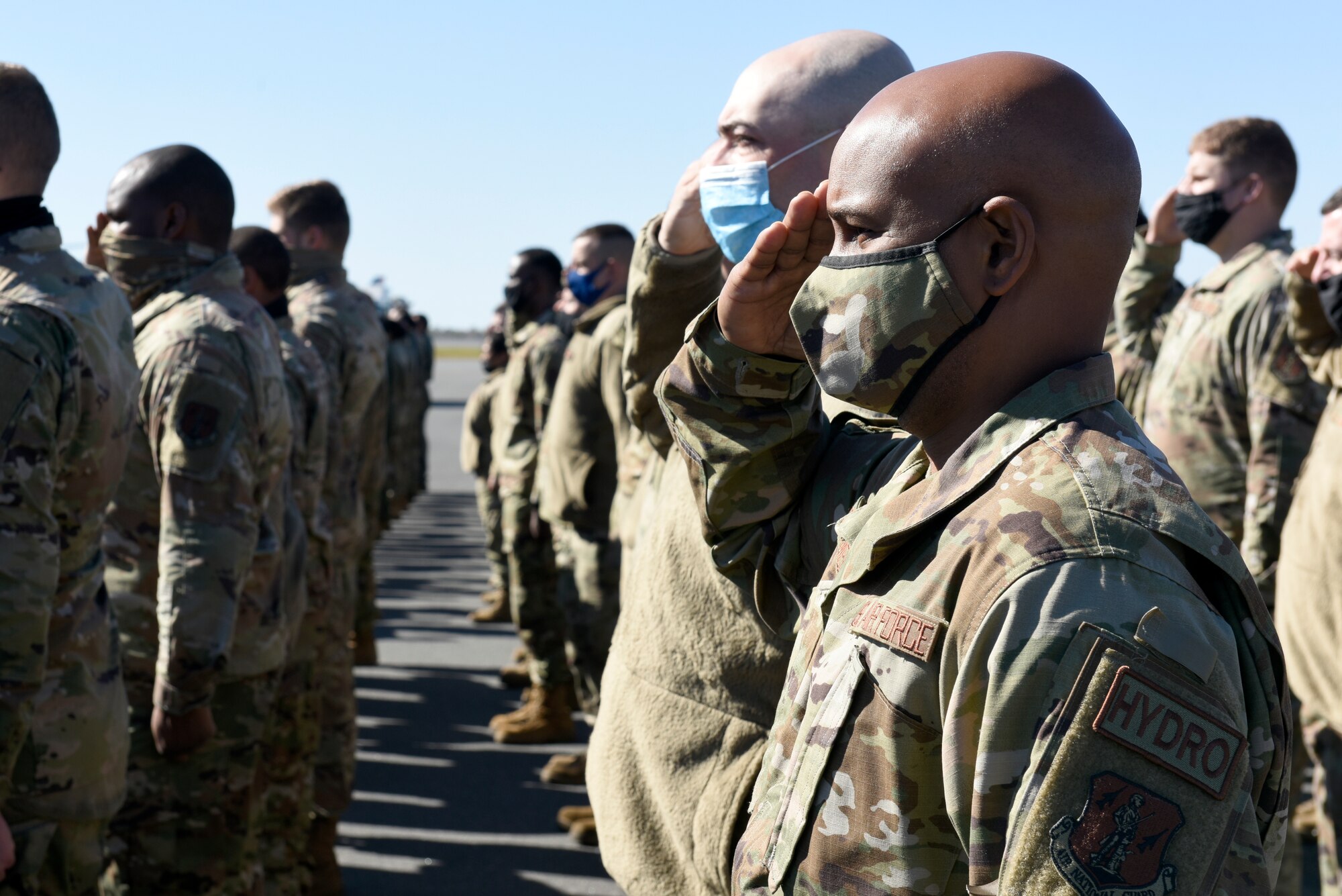 U.S. Airmen salute U.S. Air Force Col. Joseph H. “Jaye” Stepp IV, 145th Airlift Wing commander, during a ramp formation held at the North Carolina Air National Guard (NCANG) Base, Charlotte Douglas International Airport, Nov. 7, 2021. The Ramp Formation is a time-honored tradition at the NCANG in which the 145th Airlift Wing Commander is able to address their Airmen as a whole and incite moral and a better understanding for the mission of the NCANG.