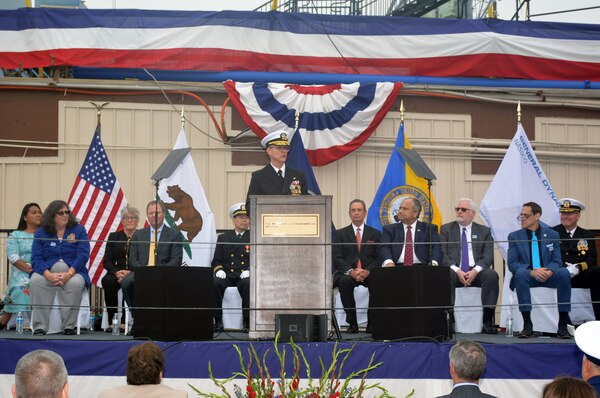 Rear Adm. Michael Wettlaufer, commander, Military Sealift Command, addresses the audience during the christening ceremony of MSC's newest ship fleet replenishment oiler USNS Harvey Milk.