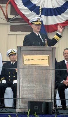 Rear Adm. Michael Wettlaufer, commander, Military Sealift Command, addresses the audience during the christening ceremony for MSC's newest ship, fleet replenishment oiler USNS Harvey Milk (T-AO 206).