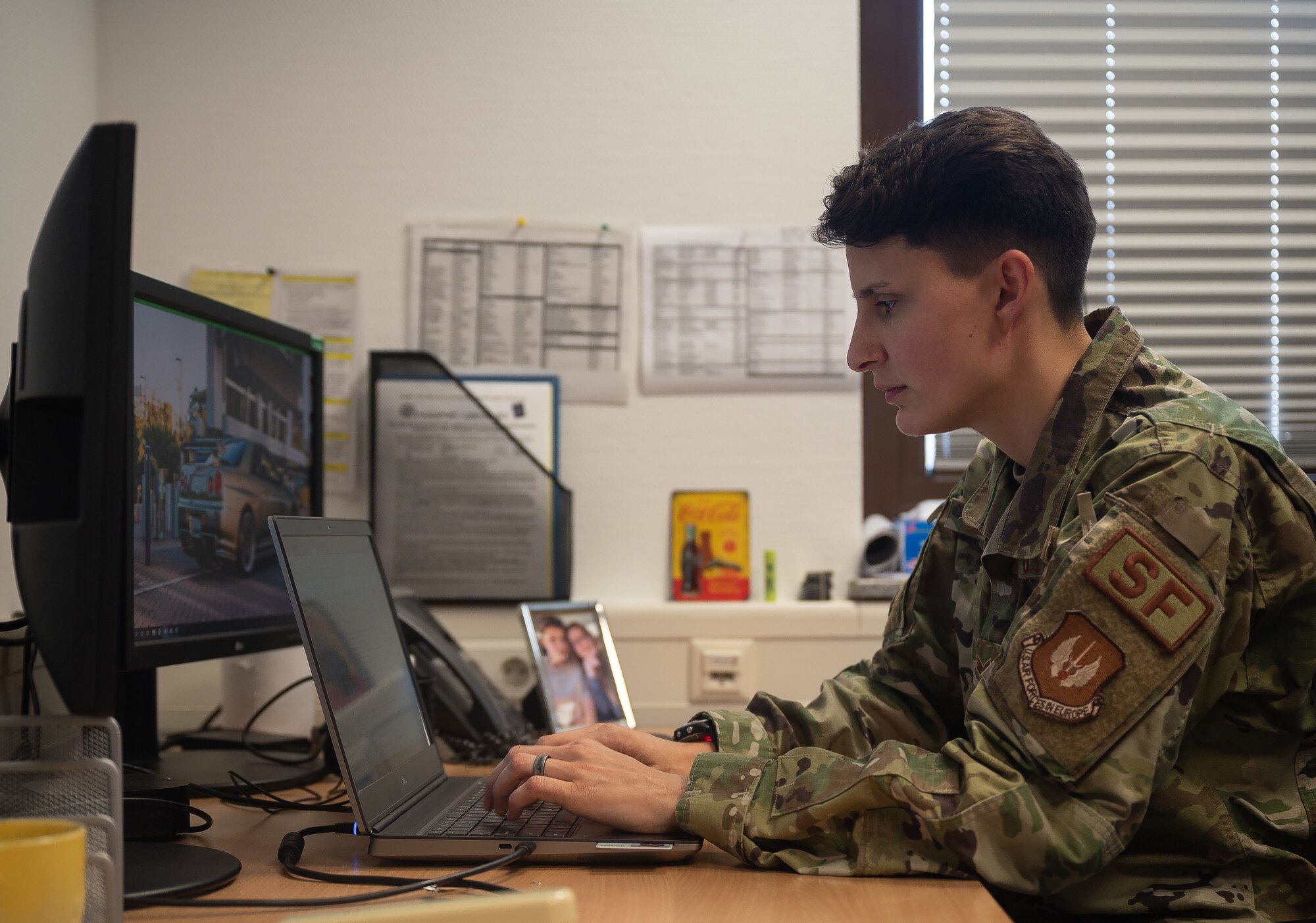 Airman touches keyboard