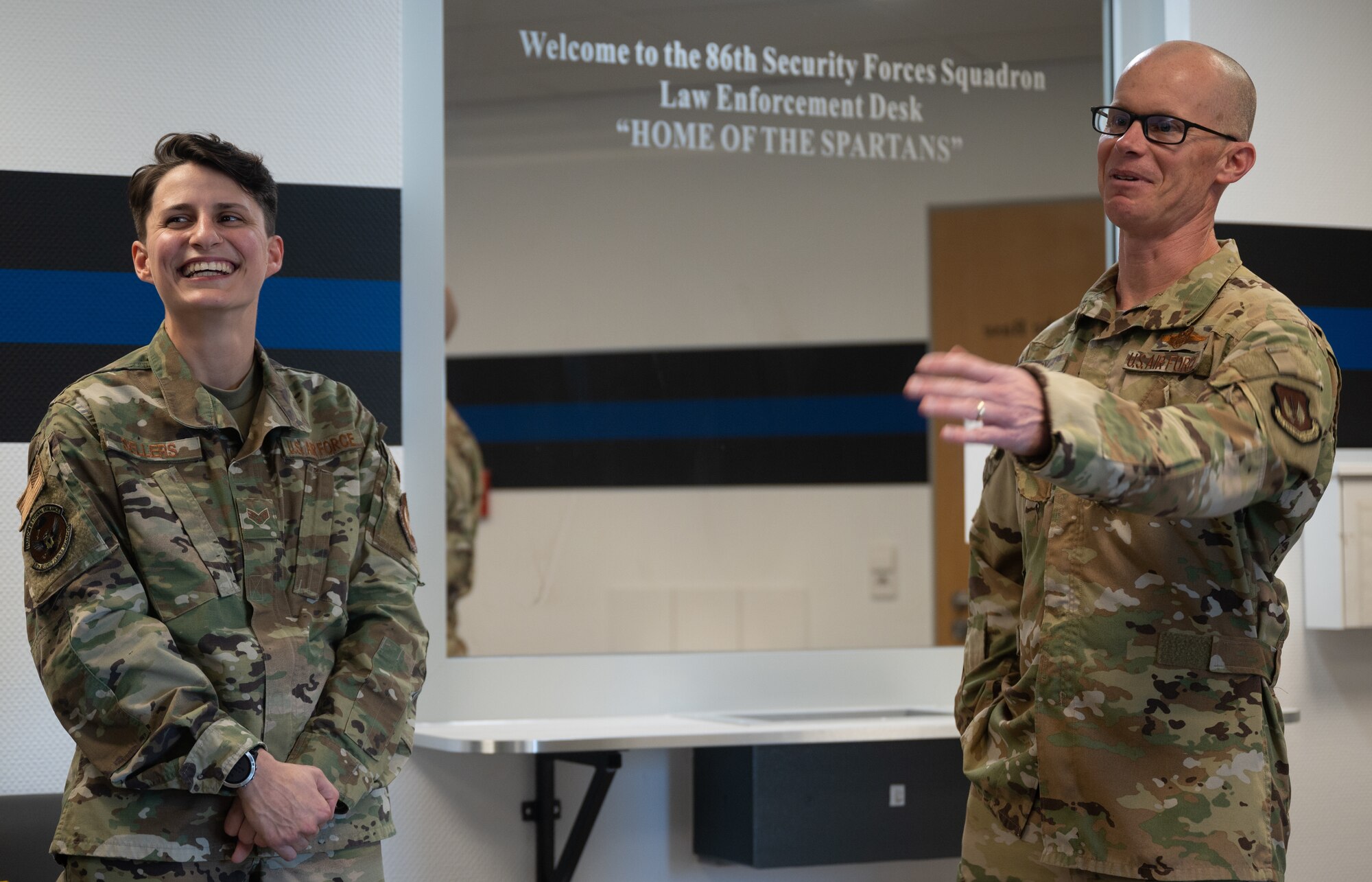 Two Airman laugh together