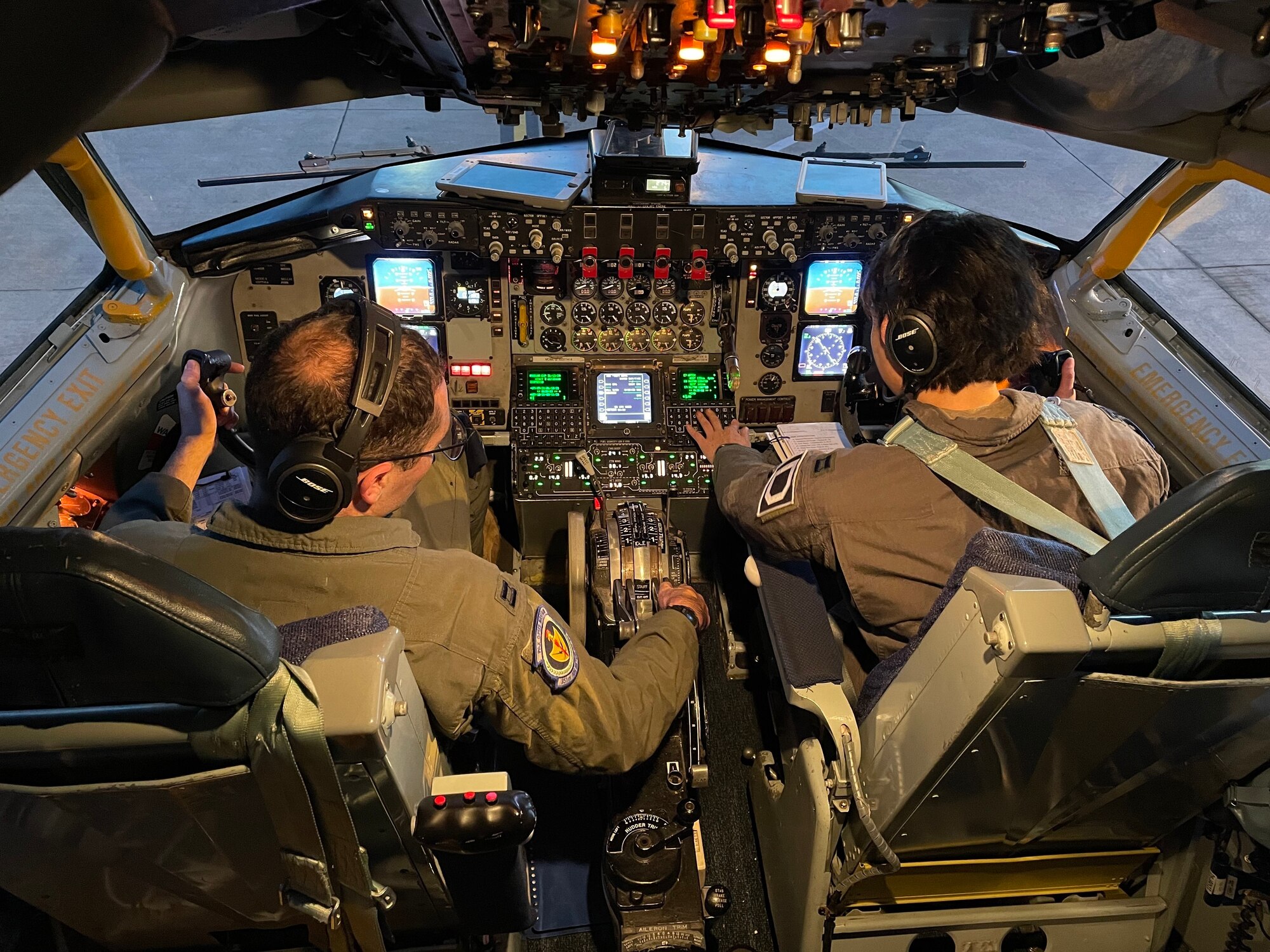 U.S. Air Force Capt. Joseph Tomassi, left, 351st Air Refueling Squadron pilot, and Capt. Katharine Kopinski, 351st ARS pilot, perform preflight checks on a KC-135 Stratotanker aircraft before a refueling mission during exercise Castle Forge at Royal Air Force Mildenhall, England, Nov. 1, 2021. The U.S. and Europe are mutually committed to facing emerging malignant forces and evolving strategic challenges. Alongside F-15 operations in the Black Sea Region, Castle Forge encompasses the USAFE MAJCOM-wide Agile Combat Employment Initial Operating Capability capstone event. Both Castle Forge’s components will better enable forces to quickly disperse and continue to deliver air power from locations with varying levels of capacity and support, ensuring Airmen are always ready to respond to potential threats. (U.S. Air Force photo by Senior Airman Joseph Barron)