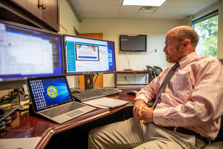 John L. Adams, U.S. Army Corps of Engineers Transatlantic Division Senior Executive Officer and Programs and Business regional director, watches the Division's virtual presentation on engineering and logistic support for the U.S. Special Operations Forces at the Division's headquarters in Winchester, Va., Oct. 26.