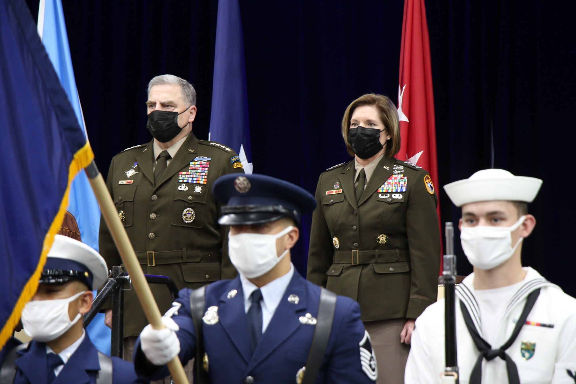 Members of the U.S. Southern Command Honor Guard present the colors while Chairman of the Joint Chiefs of Staff Gen. Mark A. Milley and U.S. Army Gen. Laura J. Richardson, incoming commander of U.S. Southern Command, stand at attention during a change of command ceremony at SOUTHCOM Headquarters in Doral, Florida, Oct. 29, 2021. Richardson will succeed U.S. Navy Adm. Craig S. Faller, who has led SOUTHCOM since November 2018 and will retire after four decades of military service. (U.S. SOUTHCOM photo by Master Sgt. Stephen J. Caruso)