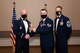 U.S. Air Force Staff Sgt. Beaux Hebert, a 354th Fighter Wing Public Affairs mass communication journeyman, receives the Distinguished Graduate Award during the Airman Leadership School (ALS) Class 22-1 graduation ceremony on Eielson Air Force Base, Alaska, Nov. 5, 2021.