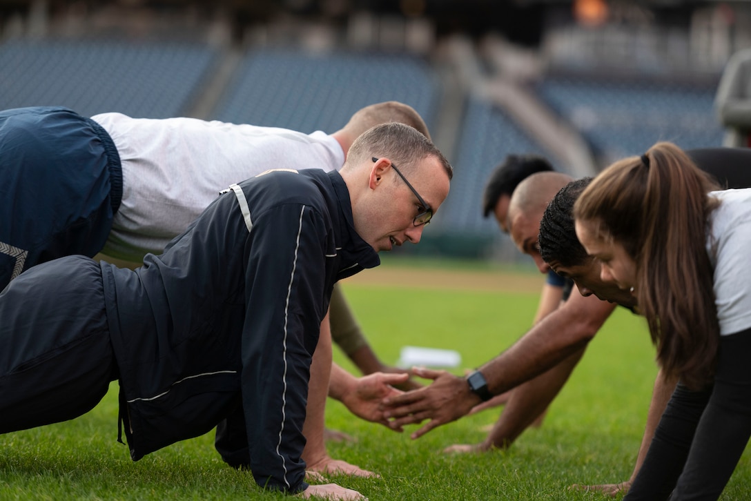 Service members from across the National Capital Region gather at Nationals Park for a group workout, Nov. 1, 2021.