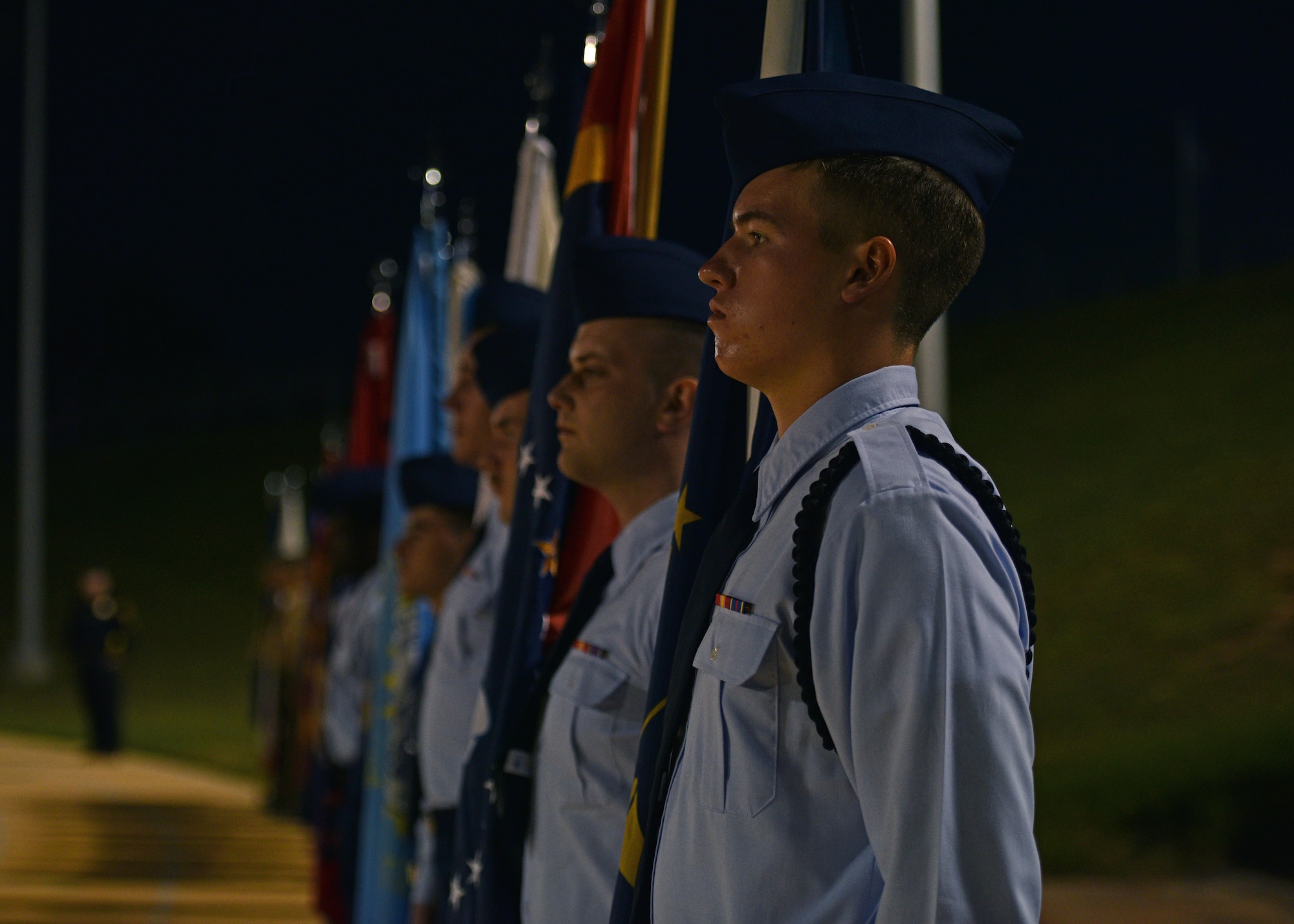 17th Training Wing students held the state flags during the Military Appreciation Night at the 1st Community Credit Union Field, Nov. 6, 2021. Volunteers from multiple branches held the 50 state flags while members from the delayed entry program took the U.S. Armed Forces Oath of Enlistment. (U.S. Air Force photo by Senior Airman Ashley Thrash)