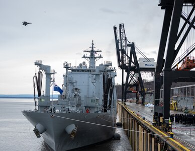 An F-22 Raptor passes by the Republic of Korea Navy (ROKN) Cruise Training Task Group’s two vessels, a Republic of Korea Ship (ROKS) Wang Geon (DDH-978) Chungmugyon Yi Sun-sin-sin-class destroyer and ROKS So Yan (AOE-51), a combat support ship, at the Port of Alaska, Anchorage, Nov. 4, 2021. The ROKN Cruise Training Task Group visited Alaska during a 67-day voyage, which marked the first ever trip for ROKN vessels to the state.(U.S. Air Force Airman 1st Class Mario Calabro)