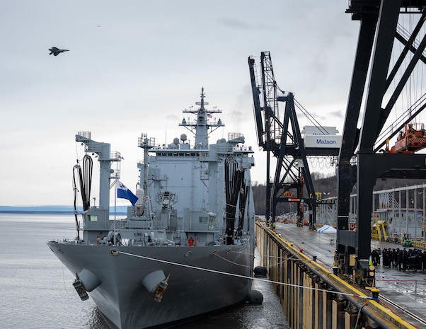 An F-22 Raptor passes by the Republic of Korea Navy (ROKN) Cruise Training Task Group’s two vessels, a Republic of Korea Ship (ROKS) Wang Geon (DDH-978) Chungmugyon Yi Sun-sin-sin-class destroyer and ROKS So Yan (AOE-51), a combat support ship, at the Port of Alaska, Anchorage, Nov. 4, 2021. The ROKN Cruise Training Task Group visited Alaska during a 67-day voyage, which marked the first ever trip for ROKN vessels to the state.(U.S. Air Force Airman 1st Class Mario Calabro)