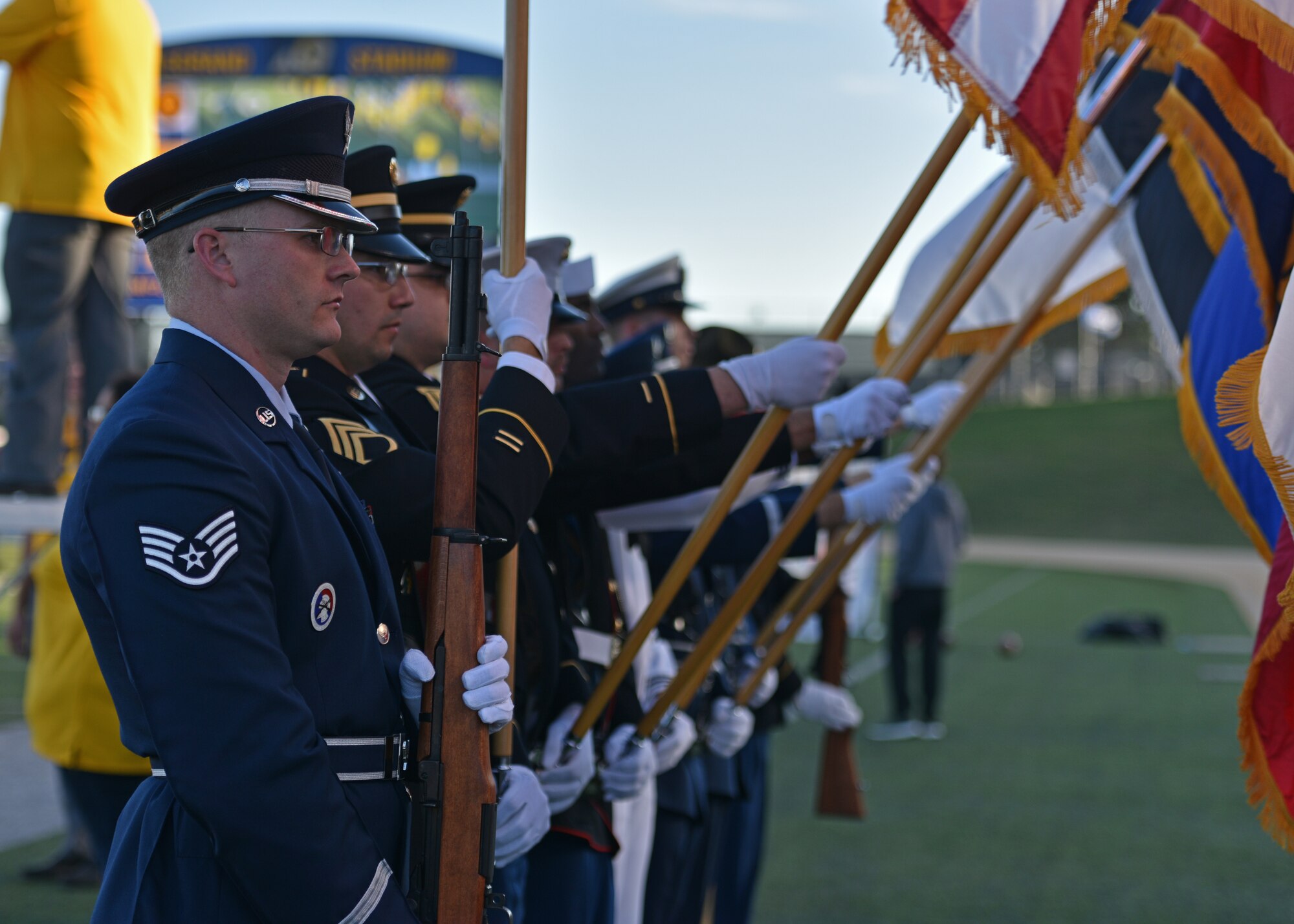 The Goodfellow Joint Service Color Guard presented the colors during the Military Appreciation Night at the 1st Community Credit Union Field, Nov. 6, 2021. The JSCG presented the colors at half-time while members from the delayed entry program sworn into the U.S. Armed Forces. (U.S. Air Force photo by Senior Airman Ashley Thrash)