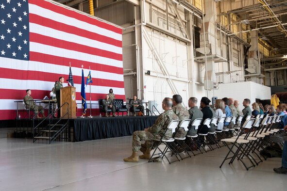 A crowd views a ceremony
