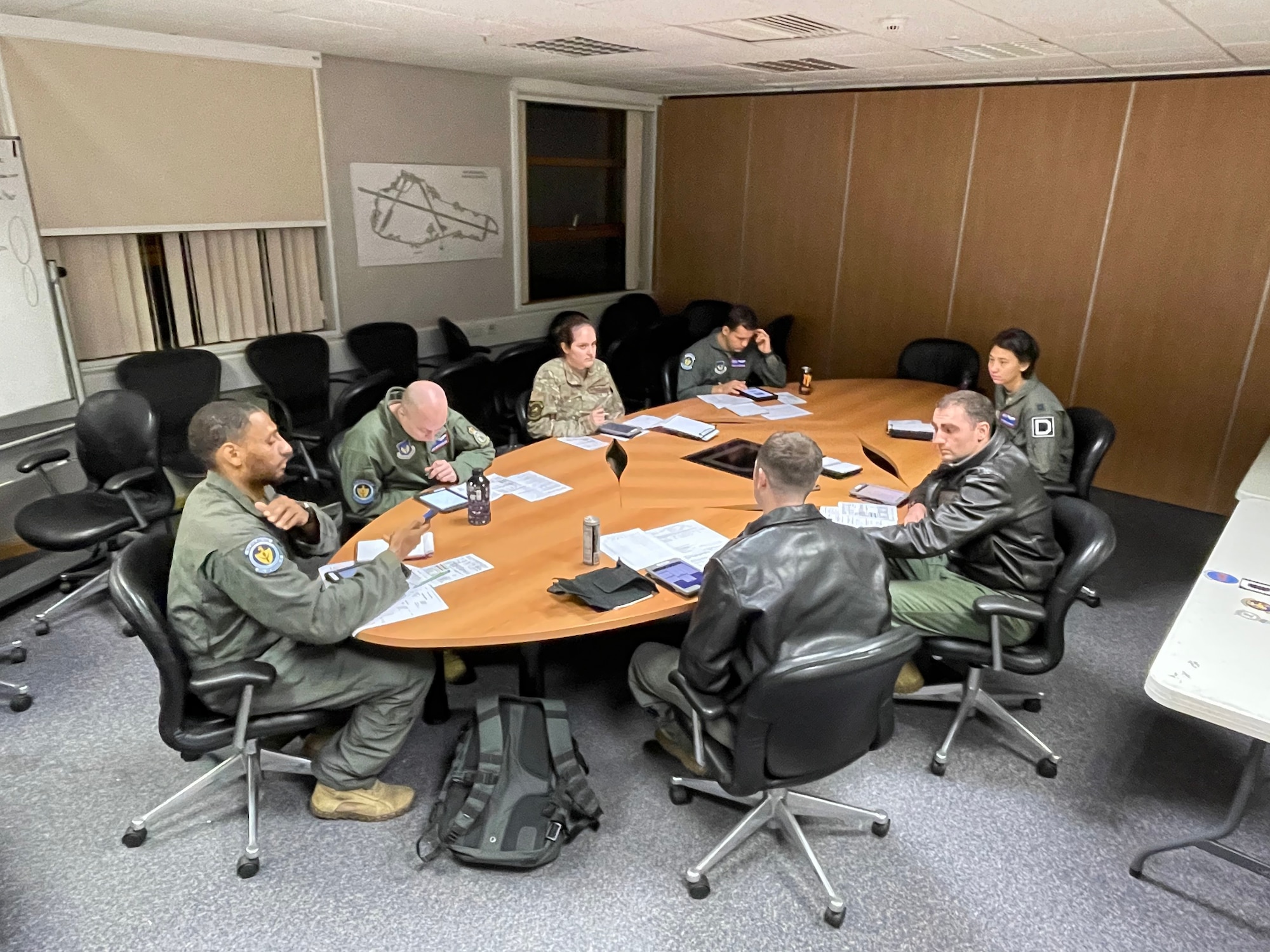U.S. Airmen assigned to the 351st Air Refueling Squadron hold a preflight briefing during exercise Castle Forge at Royal Air Force Mildenhall, England, Nov. 1, 2021. The U.S. Air Force’s forward-deployed forces are engaged, postured and ready with credible force to assure, deter and defend in an increasingly complex security environment. Alongside F-15 operations in the Black Sea Region, Castle Forge encompasses the USAFE MAJCOM-wide Agile Combat Employment Initial Operating Capability capstone event. Both Castle Forge’s components will better enable forces to quickly disperse and continue to deliver air power from locations with varying levels of capacity and support, ensuring Airmen are always ready to respond to potential threats. (U.S. Air Force photo by Senior Airman Joseph Barron)