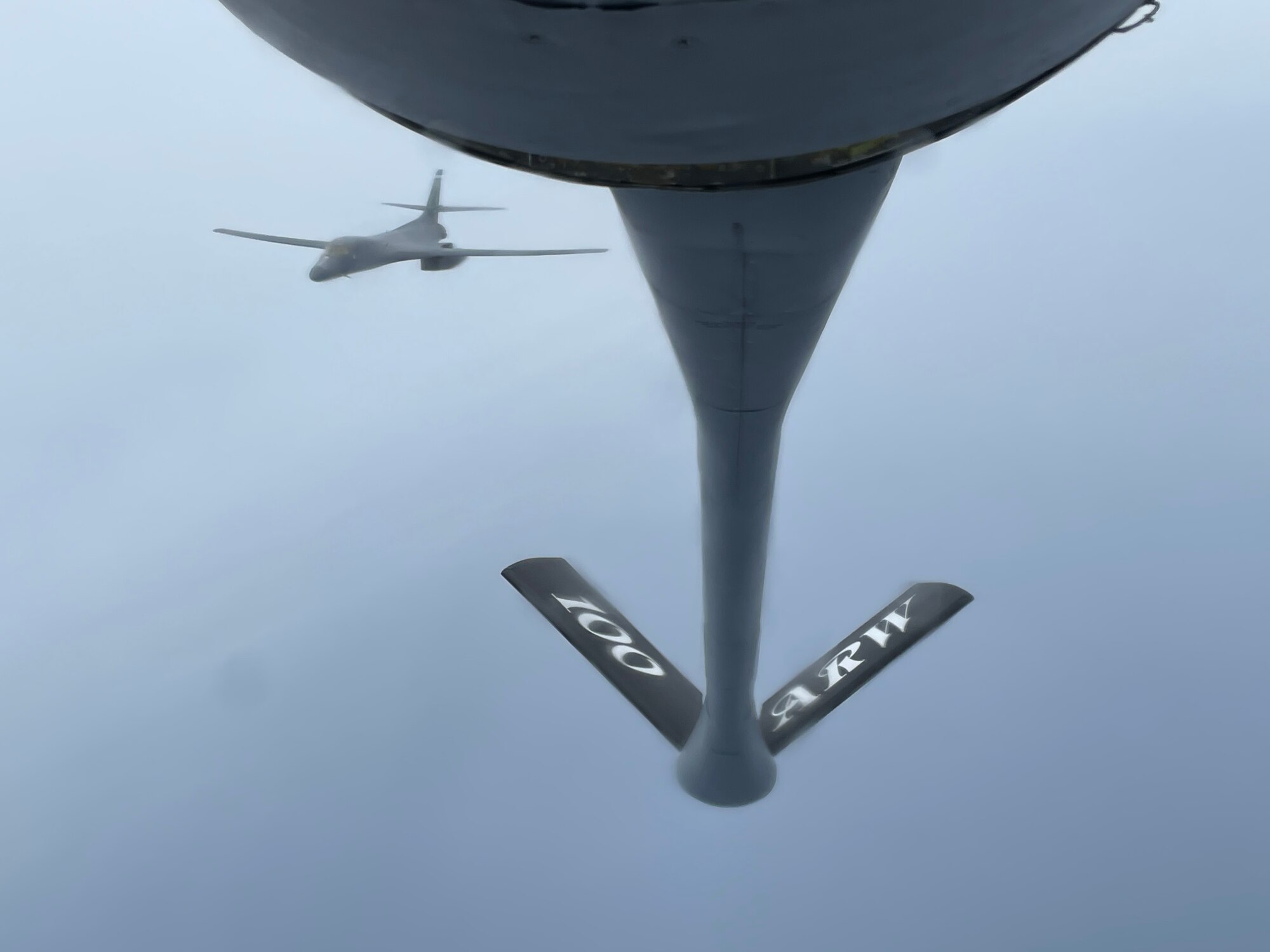 A U.S. Air Force B-1B Lancer aircraft assigned to the 9th Expeditionary Bomb Squadron departs from a KC-135 Stratotanker aircraft assigned to the 100th Air Refueling Wing, Royal Air Force Mildenhall, England, after receiving fuel during exercise Castle Forge off the coast of Norway, Nov. 1, 2021. Training with joint and combined allies and partners increases lethality and enhances interoperability, allowing U.S. forces to counter military aggression and coercion by sharing responsibilities for common defense. Alongside F-15 operations in the Black Sea Region, Castle Forge encompasses the USAFE MAJCOM-wide Agile Combat Employment Initial Operating Capability capstone event. Both Castle Forge’s components will better enable forces to quickly disperse and continue to deliver air power from locations with varying levels of capacity and support, ensuring Airmen are always ready to respond to potential threats. (U.S. Air Force photo by Senior Airman Joseph Barron)