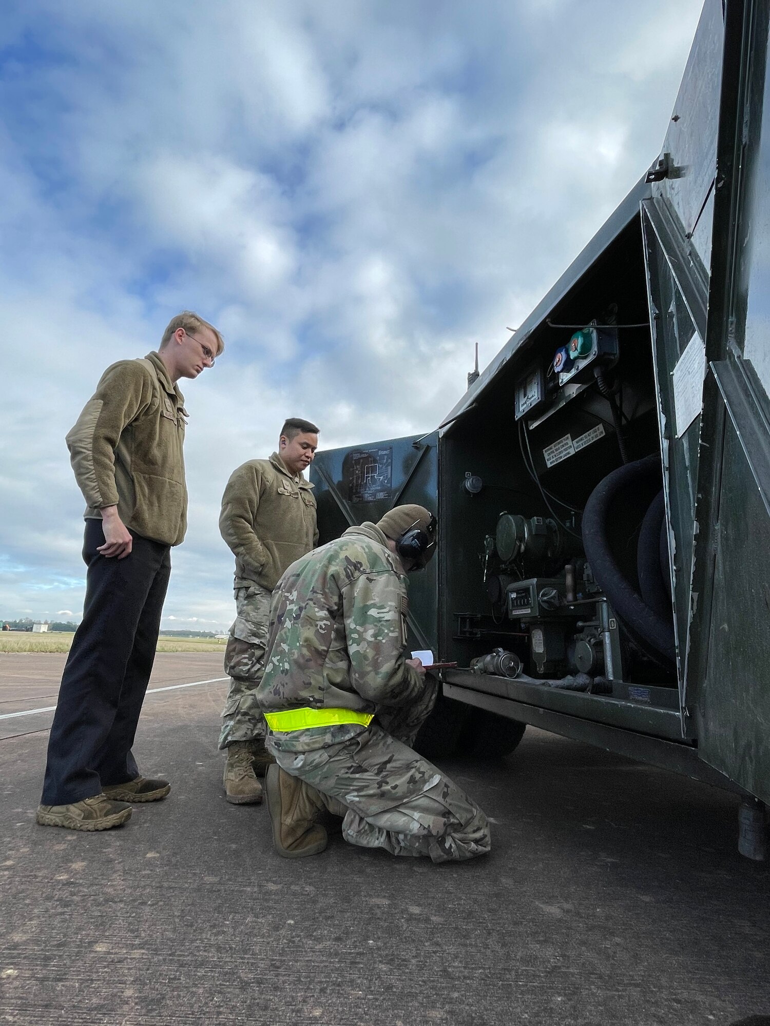 U.S. Airmen assigned to the 100th Air Refueling Wing account for diesel fuel during exercise Castle Forge at Royal Air Force Fairford, England, Nov. 3, 2021. Exercising elements of Agile Combat Employment enables U.S. forces in Europe to operate from locations with varying levels of capacity and support, ensuring Airmen and aircrews are postured to deliver lethal combat power across the spectrum of military operations. In addition to F-15 Eagle aircraft operations in the Black Sea Region, Castle Forge encompasses the USAFE-wide ACE capstone event. Castle Forge’s components will better enable forces to quickly disperse and continue to deliver air power from locations with varying levels of capacity and support, ensuring Airmen are always ready to respond to potential threats. (U.S. Air Force photo by Senior Airman Joseph Barron)