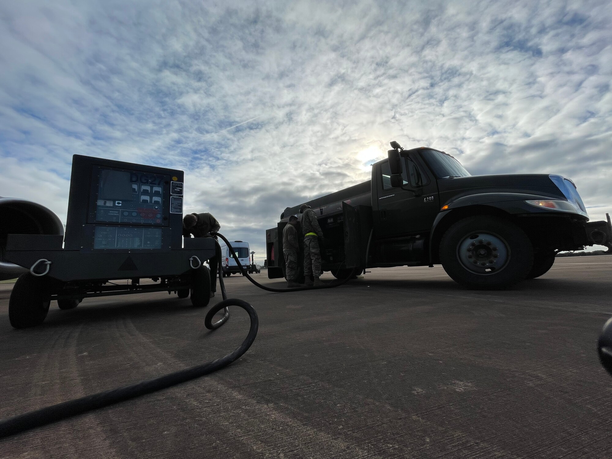 U.S. Airmen assigned to the 100th Air Refueling Wing fill an aerospace ground equipment power cart with diesel fuel during exercise Castle Forge at Royal Air Force Fairford, England, Nov. 3, 2021. The U.S. Air Force’s forward-deployed forces are engaged, postured and ready with credible force to assure, deter and defend in an increasingly complex security environment. In addition to F-15 Eagle aircraft operations in the Black Sea Region, Castle Forge encompasses the USAFE-wide Agile Combat Employment capstone event. Castle Forge’s components will better enable forces to quickly disperse and continue to deliver air power from locations with varying levels of capacity and support, ensuring Airmen are always ready to respond to potential threats. (U.S. Air Force photo by Senior Airman Joseph Barron)
