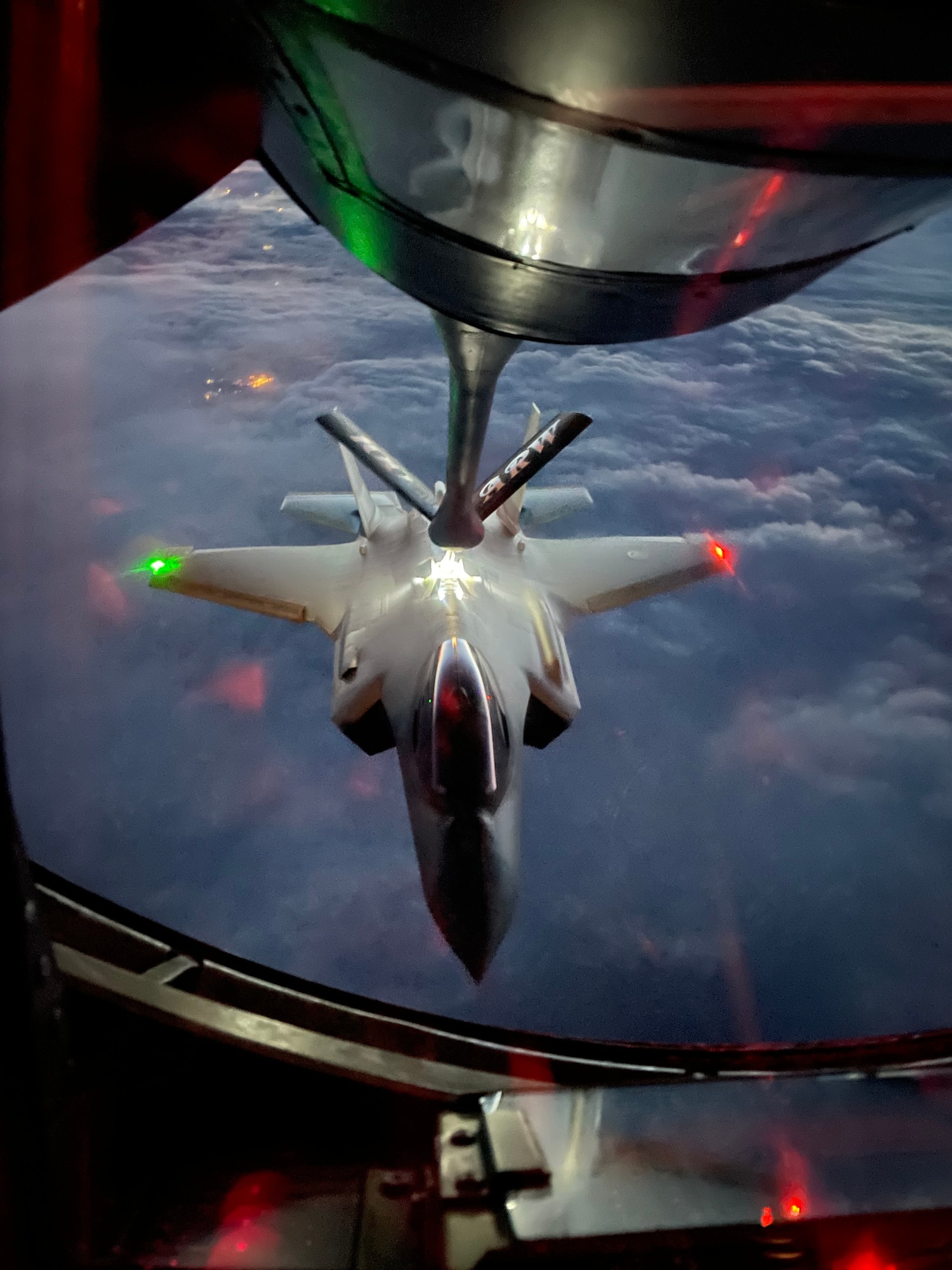 A Norwegian air force F-35A Lighting II aircraft receives fuel from a U.S. Air Force KC-135 Stratotanker aircraft assigned to the 100th Air Refueling Wing, Royal Air Force Mildenhall, England, during exercise Castle Forge over Norway, Nov. 4, 2021. Training with joint and combined allies and partners increases lethality and enhances interoperability, allowing U.S. forces to counter military aggression and coercion by sharing responsibilities for common defense. In addition to F-15 Eagle aircraft operations in the Black Sea Region, Castle Forge encompasses the USAFE-wide Agile Combat Employment capstone event. Castle Forge’s components will better enable forces to quickly disperse and continue to deliver air power from locations with varying levels of capacity and support, ensuring Airmen are always ready to respond to potential threats. (U.S. Air Force photo by Senior Airman Joseph Barron)