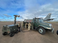 U.S. Airmen assigned to the 100th Air Refueling Wing refuel an aerospace ground equipment light during exercise Castle Forge at Royal Air Force Fairford, England, Nov. 3, 2021. The U.S. Air Force’s forward-deployed forces are engaged, postured and ready with credible force to assure, deter and defend in an increasingly complex security environment. In addition to F-15 Eagle aircraft operations in the Black Sea Region, Castle Forge encompasses the USAFE-wide Agile Combat Employment capstone event. Castle Forge’s components will better enable forces to quickly disperse and continue to deliver air power from locations with varying levels of capacity and support, ensuring Airmen are always ready to respond to potential threats. (U.S. Air Force photo by Senior Airman Joseph Barron)