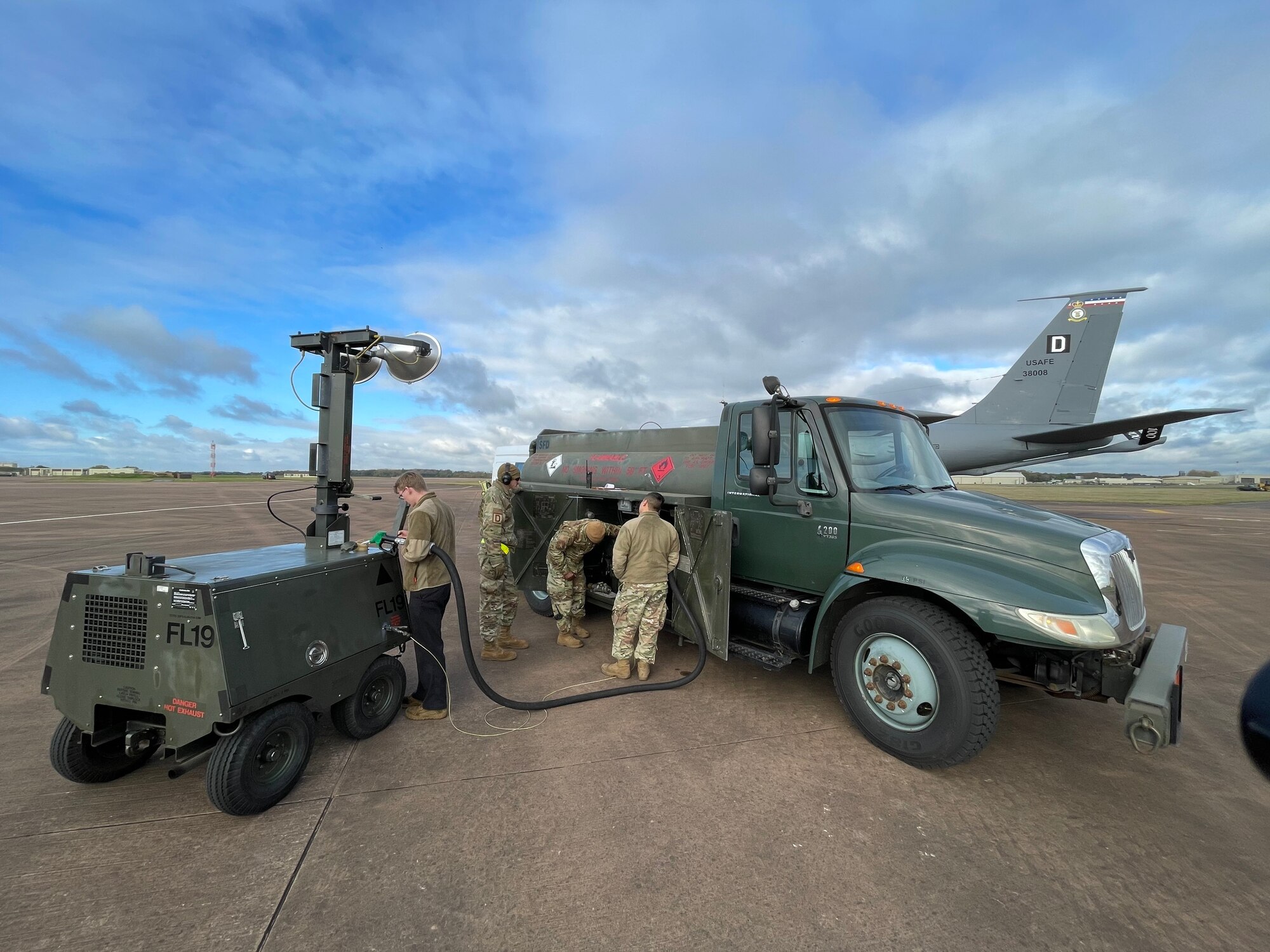 U.S. Airmen assigned to the 100th Air Refueling Wing refuel an aerospace ground equipment light during exercise Castle Forge at Royal Air Force Fairford, England, Nov. 3, 2021. The U.S. Air Force’s forward-deployed forces are engaged, postured and ready with credible force to assure, deter and defend in an increasingly complex security environment. In addition to F-15 Eagle aircraft operations in the Black Sea Region, Castle Forge encompasses the USAFE-wide Agile Combat Employment capstone event. Castle Forge’s components will better enable forces to quickly disperse and continue to deliver air power from locations with varying levels of capacity and support, ensuring Airmen are always ready to respond to potential threats. (U.S. Air Force photo by Senior Airman Joseph Barron)