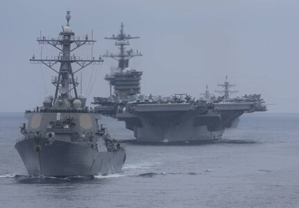 PACIFIC OCEAN — Arleigh Burke-class destroyer USS Stockdale (DDG 106), armed with the Aegis Combat System, steams in formation with other ships and aircraft from Carrier Strike Group (CSG) 1, including Nimitz-class aircraft carrier USS Carl Vinson (CVN 70) on July 11, 2021. (Intelligence Specialist 1st Class Alexander Fraser/ U.S. Navy photo)