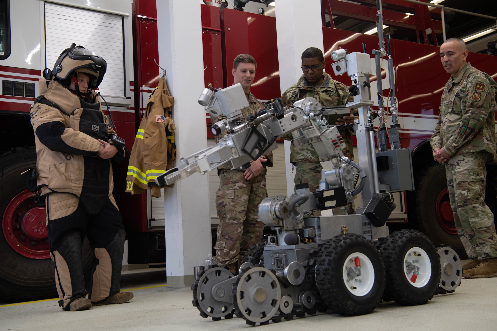 Airmen operate robots