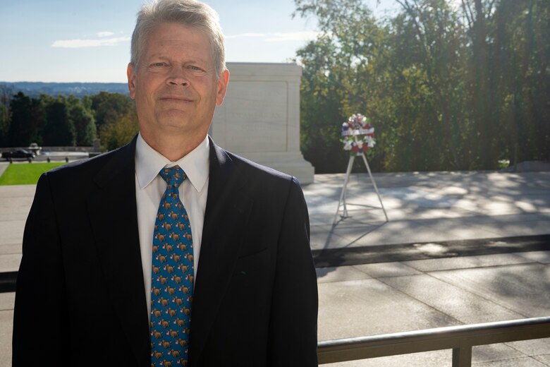 U.S. Navy Veteran Mike Rafter, U.S. Army Corps of Engineers, Baltimore District, Construction Services Branch chief, pays tribute at the Arlington National Cemetery's Tomb of the Unknown Soldier in Arlington, Va., Oct. 22, 2021. One hundred years after World War I Unknown's burial, the Tomb of the Unknown Soldier symbolizes service and sacrifice, mourning and memory. (U.S. Army photo by Greg Nash)