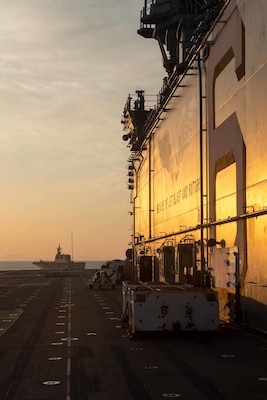 EAST CHINA SEA (Nov. 3, 2021) The forward-deployed amphibious assault ship USS America (LHA 6) sails in formation with the Japan Maritime Self-Defense Force ship JS Ise (DDH 182). America, lead ship of the America Amphibious Ready Group, is operating in the U.S. 7th Fleet area of responsibility to enhance interoperability with allies and partners and serve as a ready response force to defend peace and stability in the Indo-Pacific region. (U.S. Navy photo by Mass Communication Specialist 2nd Class Shelby Tucker)