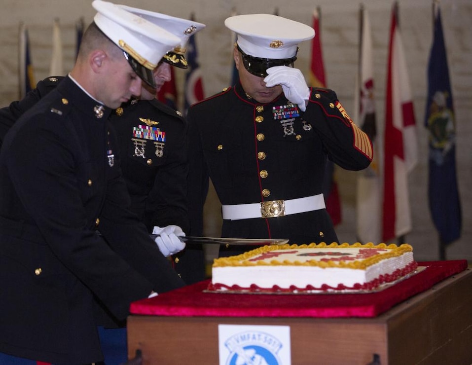 U.S. Marine Corps Sgt. Maj. Jorge L. Ortiz, (right), sergeant major, Marine Fighter Attack Training Squadron 501, Marine Aircraft Group 31, observes Capt. Zachery Ybarra, (left), adjutant, VMFAT-501, MAG 31, cut the Marine Corps Birthday cake, during VMFAT-501’s cake-cutting ceremony at Marine Corps Air Station Beaufort, South Carolina, Nov. 5, 2021. The cake-cutting is a long-standing tradition where Marines worldwide celebrate the birth of the United States Marine Corps.