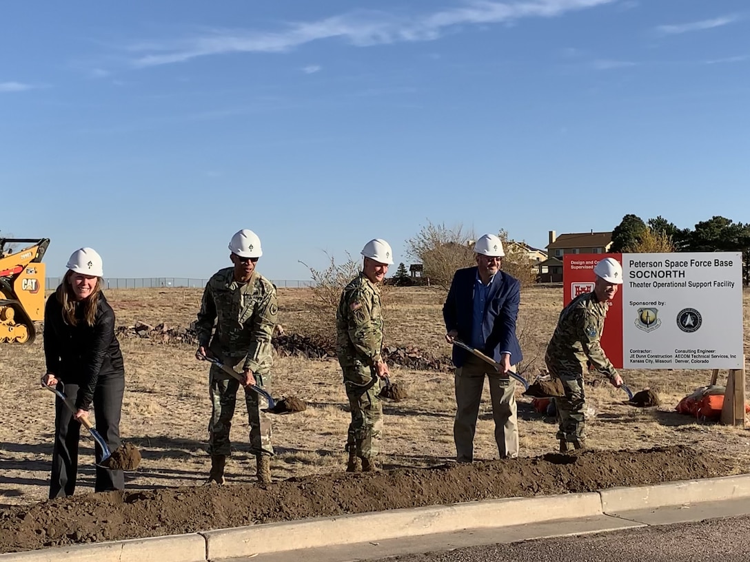 Officials broke ground on a new Special Operations Command North headquarters building at Peterson Space Force Base, Colorado, Nov. 8, 2021. The groundbreaking ceremony included Lt. Gen. A.C. Roper, deputy commander of U.S. Northern Command; Brig. Gen. Shawn R. Satterfield, commander of Special Operations Command North; Col. Shay Warakomski, commander of Peterson-Schriever Garrison; Heather Duggan, U.S. Army Corps of Engineers; and Craig Stearns, senior vice president of JE Dunn Construction. The $43.78 million project is scheduled for completion in September 2023. (DoD Photo by Lt. Ricky Rodriguez)