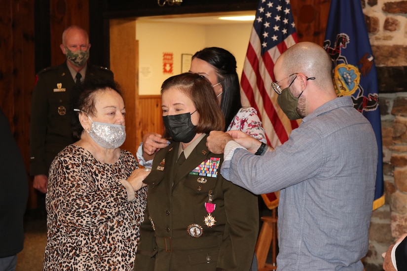 With the help of her family, Brig. Gen. Laura McHugh, deputy adjutant general - Army, Pennsylvania National Guard, was ceremoniously promoted to her current rank on Nov. 6, 2021, at Fort Indiantown Gap, Pa.  She was appointed as the deputy adjutant general - army on April 1, 2021. ( Photo by Lt. Col. Keith Hickox)