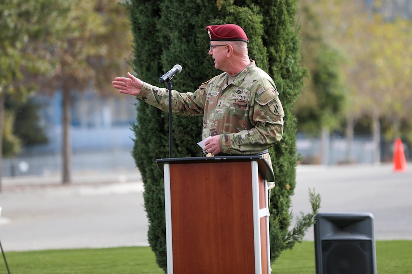 Maj. Gen. Jeffrey C. Coggin, commanding general, U.S. Army Civil Affairs and Psychological Operations Command (Airborne), thanks the 191st Army Band, “the Band of the Wild West,” for their support during the 351st Civil Affairs Command change of command ceremony at the Sgt. James Witkowski Armed Forces Reserve Center, Mountain View, California, Saturday, Nov. 6, 2021.