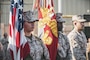 The Naval Amphibious Force, Task Force 51/5th Marine Expeditionary Brigade color guard waits for the start of the TF 51/5 Marine Corps birthday cake cutting ceremony in Bahrain, Nov. 9. TF 51/5 hosted a ceremony honoring the Marine Corps 246th birthday.