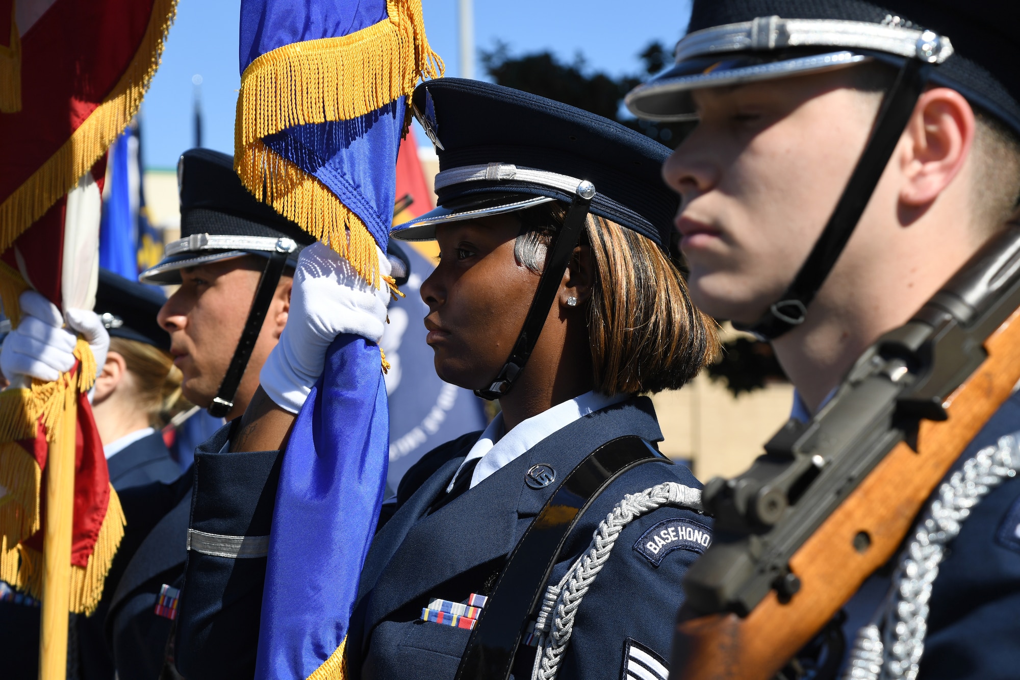 Keesler Air Force Base Honor Guard members present the colors during the 21st Annual Gulf Coast Veterans Day Parade in Biloxi, Mississippi, Nov. 6, 2021. Keesler leadership, along with hundreds of Airmen, attended and participated in the parade in support of all veterans, past and present. More than 50 unique floats, marching bands and military units marched in the largest Veterans Day parade on the Gulf Coast. (U.S. Air Force photo by Kemberly Groue)