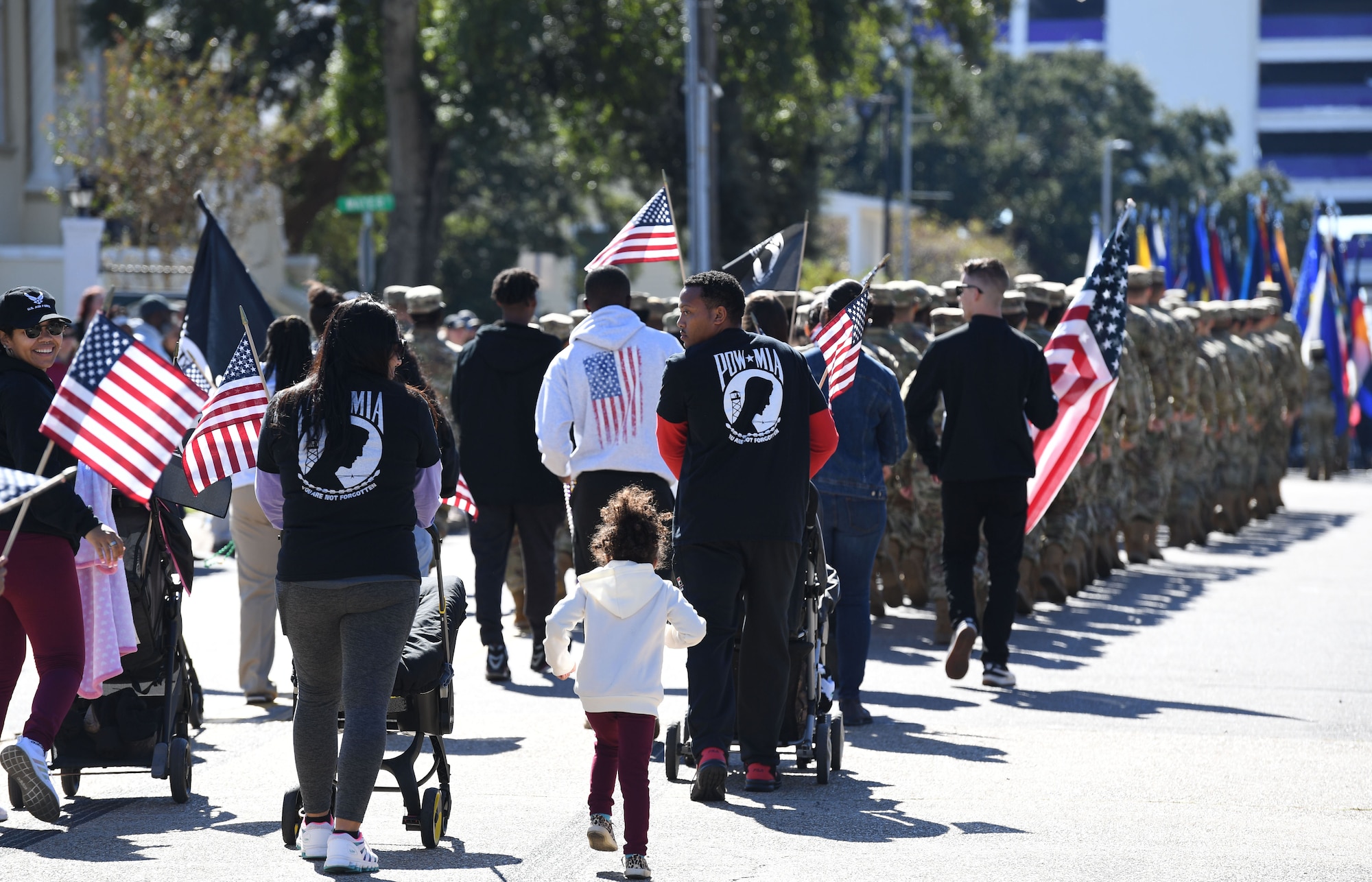 Air Force Sergeants Association members march in the 21st Annual Gulf Coast Veterans Day Parade in Biloxi, Mississippi, Nov. 6, 2021. Keesler Air Force Base leadership, along with hundreds of Airmen, attended and participated in the parade in support of all veterans, past and present. More than 50 unique floats, marching bands and military units marched in the largest Veterans Day parade on the Gulf Coast. (U.S. Air Force photo by Kemberly Groue)