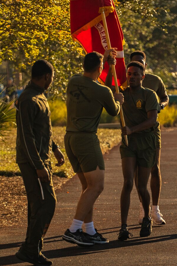 Sgt. Keyshawn Donley, left, and Sgt. John Price, right, both personnel clerks with Marine Forces Reserve (MARFORRES) take part in the Marine Corps birthday run at Marine Corps Support Facility New Orleans, Nov. 9, 2021. MARFORRES is running a combined total of 246 miles over the course of three days to celebrate the 246th birthday of the U.S. Marine Corps. (U.S. Marine Corps photo by Lance Cpl. Samwel Tabancay)