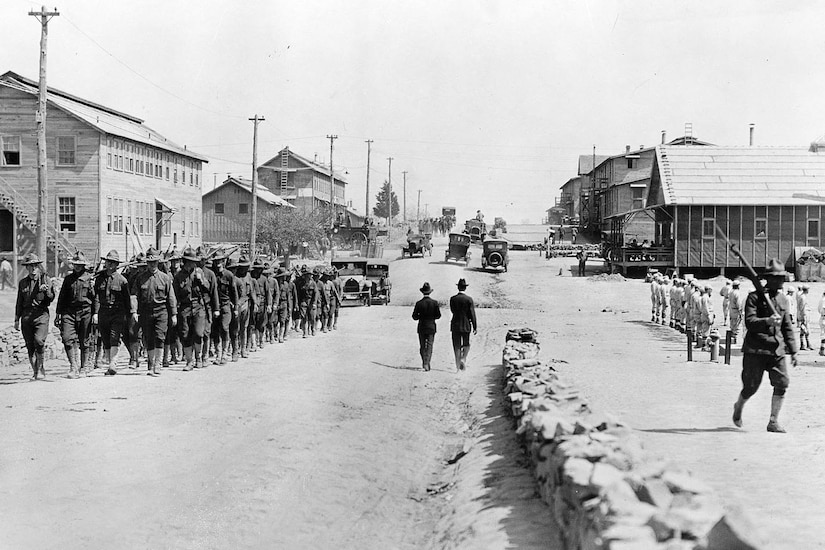 Troops march.